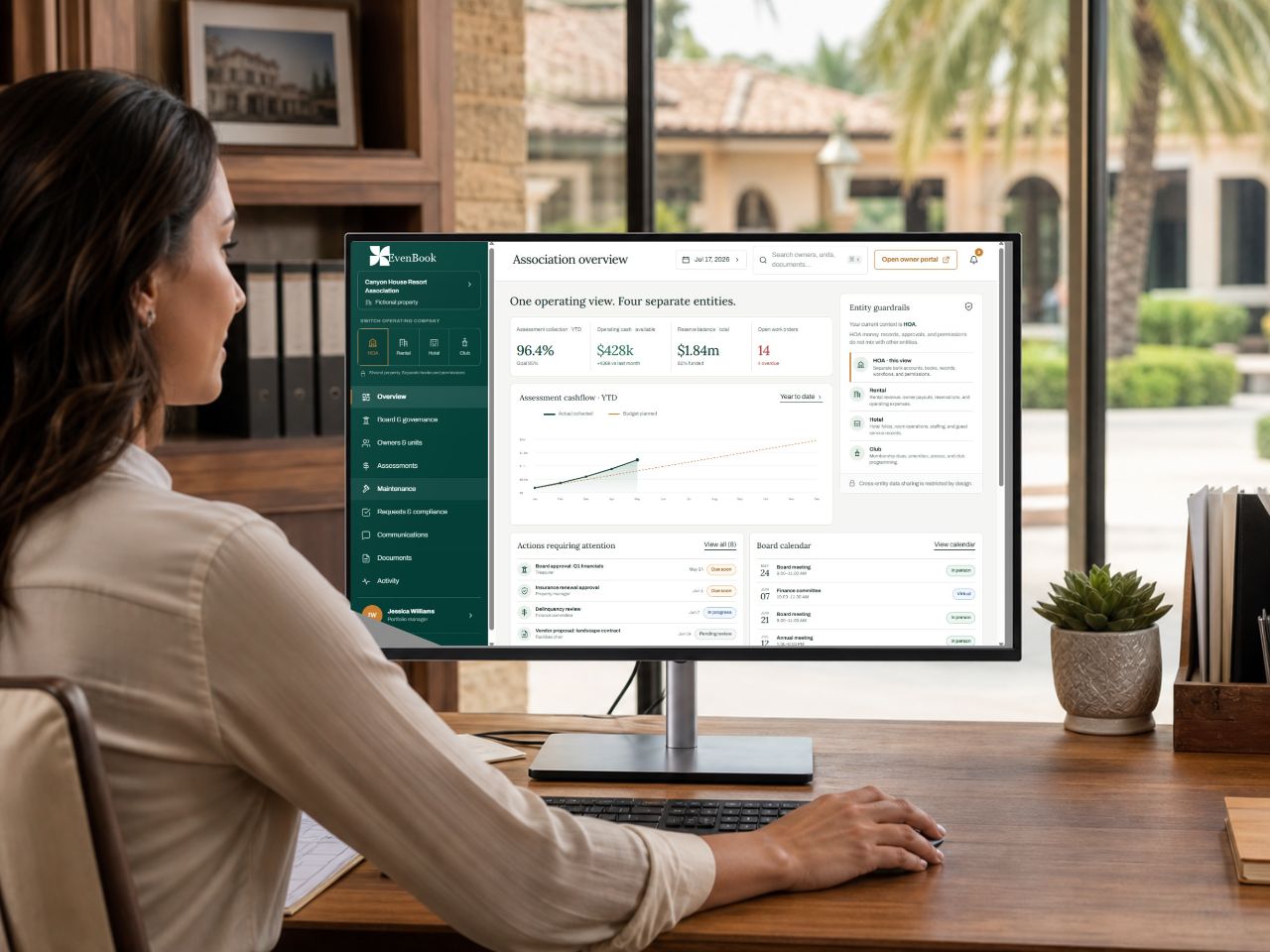 An association manager viewing the EvenBook Association Management overview on a desktop monitor